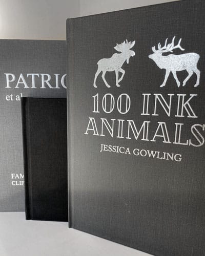 linen bound hard cover books with custom foil stamping in silver